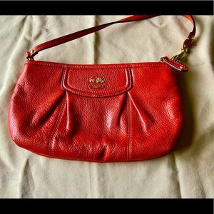 Rust colored leather Coach mini purse/ wristlet